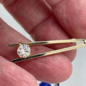 Vintage bar brooch with facetted cut glass stone